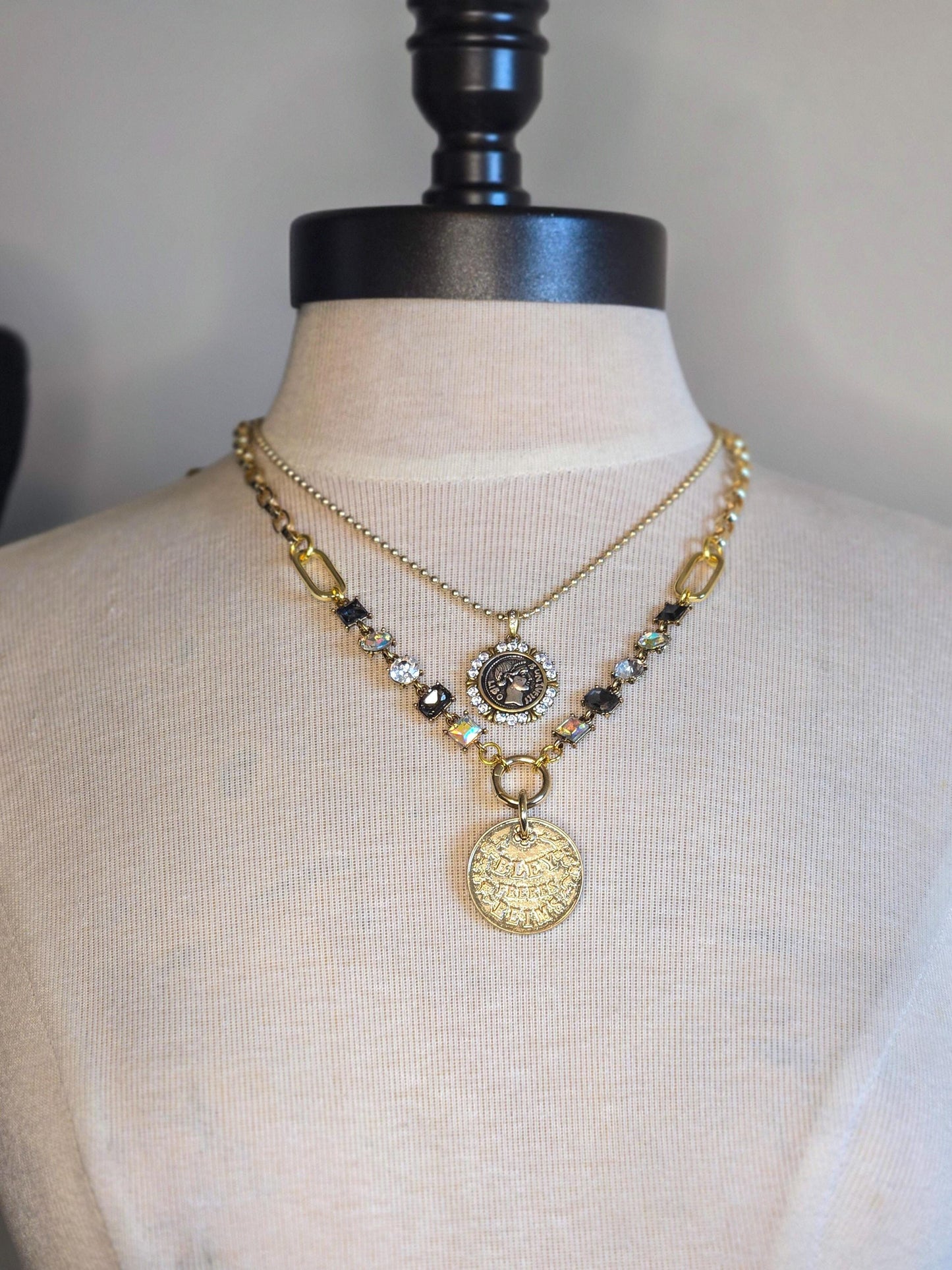 small mixed metal Greek coin pendant on gold ball chain stacked with rhinestone and French coin 22" necklace.
