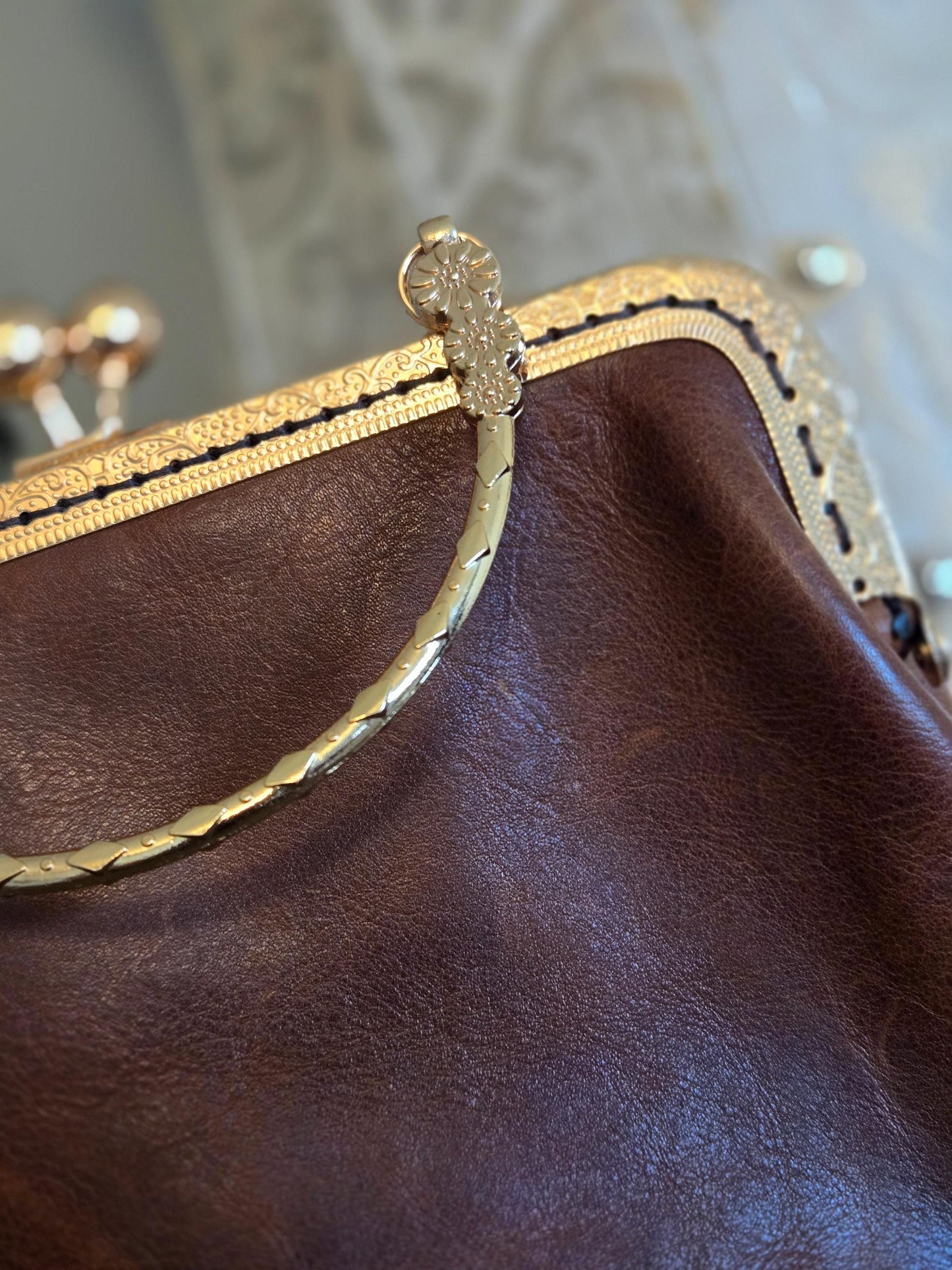 Small Brown Leather Handbag with Ball Clasp Closure