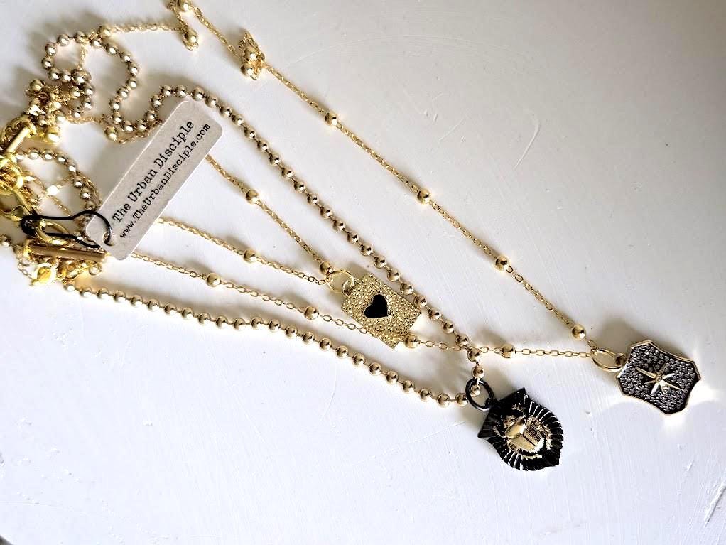 Triple Strand Necklace with Heart, Scarab & Pave Starburst Charms