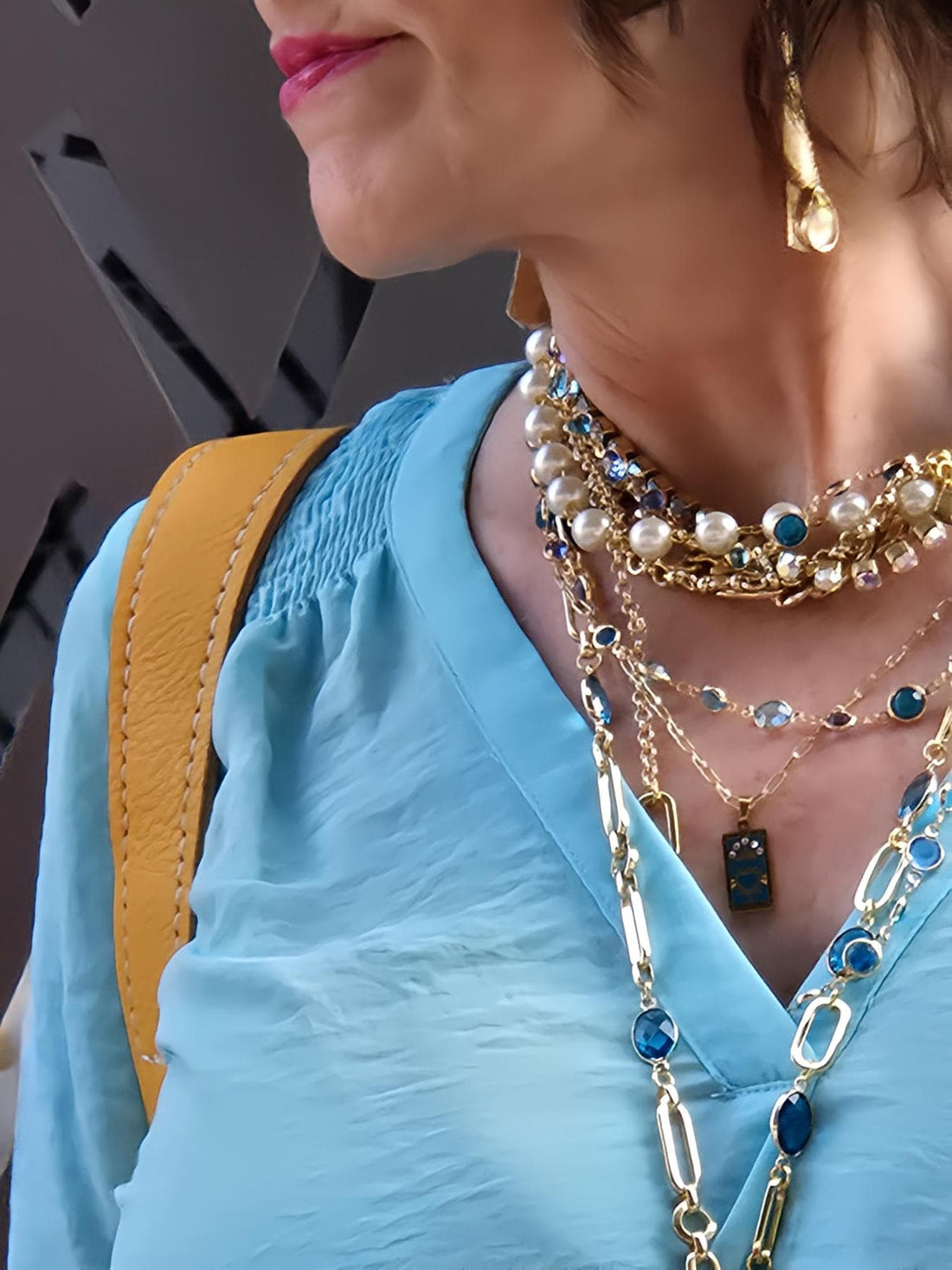 How to Wear Statement Jewelry Without Letting It Wear You