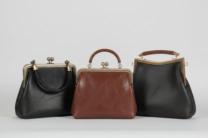 Small Brown Leather Handbag with Ball Clasp Closure