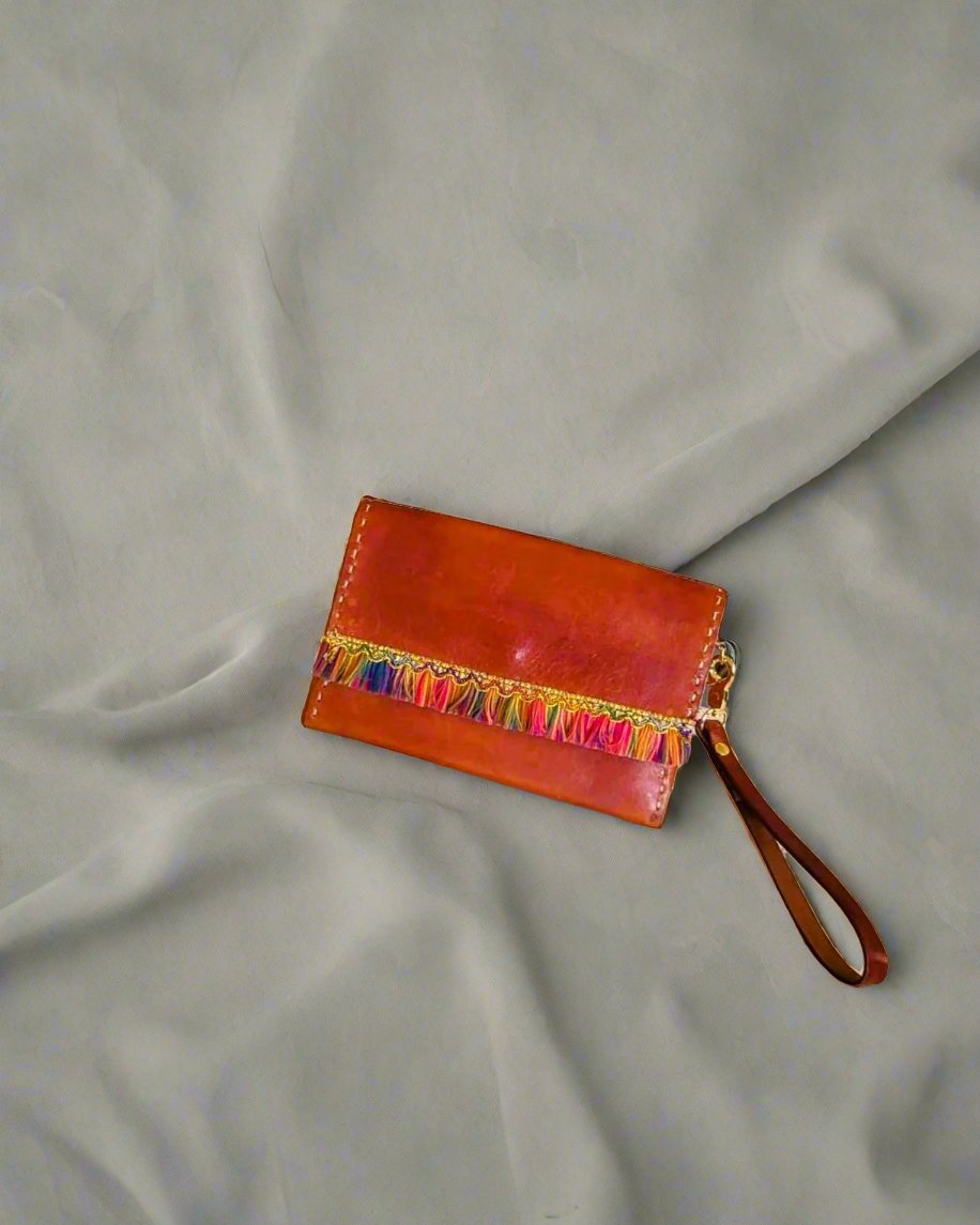 Distressed Brown Leather wristlet with blue crystal accents and colorful fringe