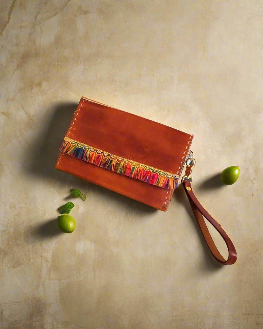 Distressed Brown Leather wristlet with blue crystal accents and colorful fringe