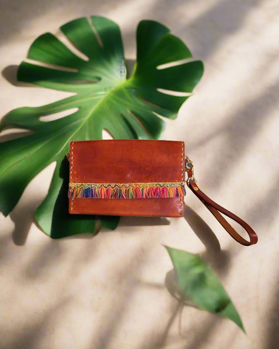 Distressed Brown Leather wristlet with blue crystal accents and colorful fringe