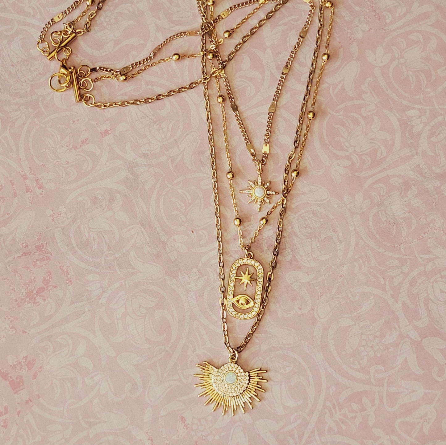 Unique Three-in-One gold Necklace Featuring Opal Starburt & Evil Eye Pendants