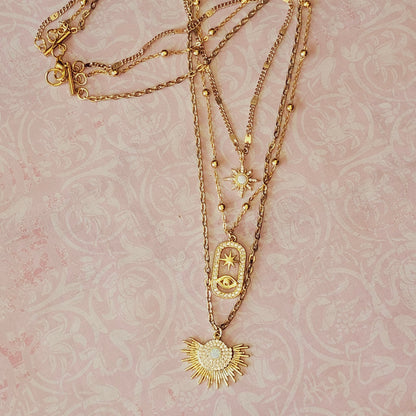 Unique Three-in-One gold Necklace Featuring Opal Starburt & Evil Eye Pendants