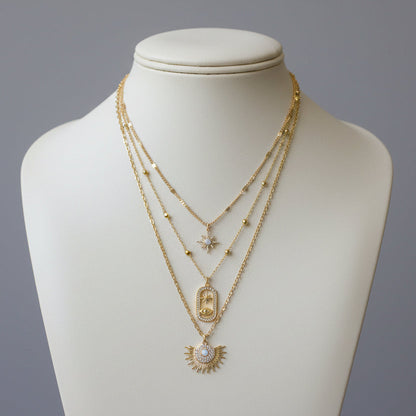 Unique Three-in-One gold Necklace Featuring Opal Starburt & Evil Eye Pendants