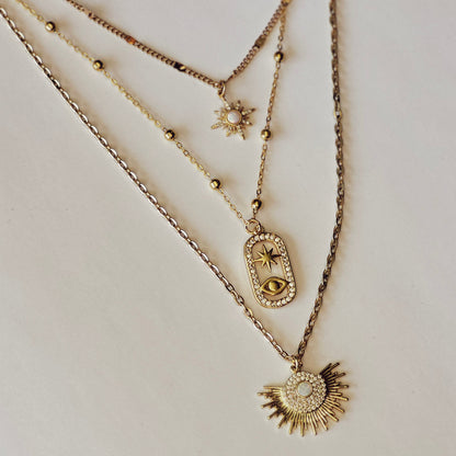 Unique Three-in-One gold Necklace Featuring Opal Starburt & Evil Eye Pendants