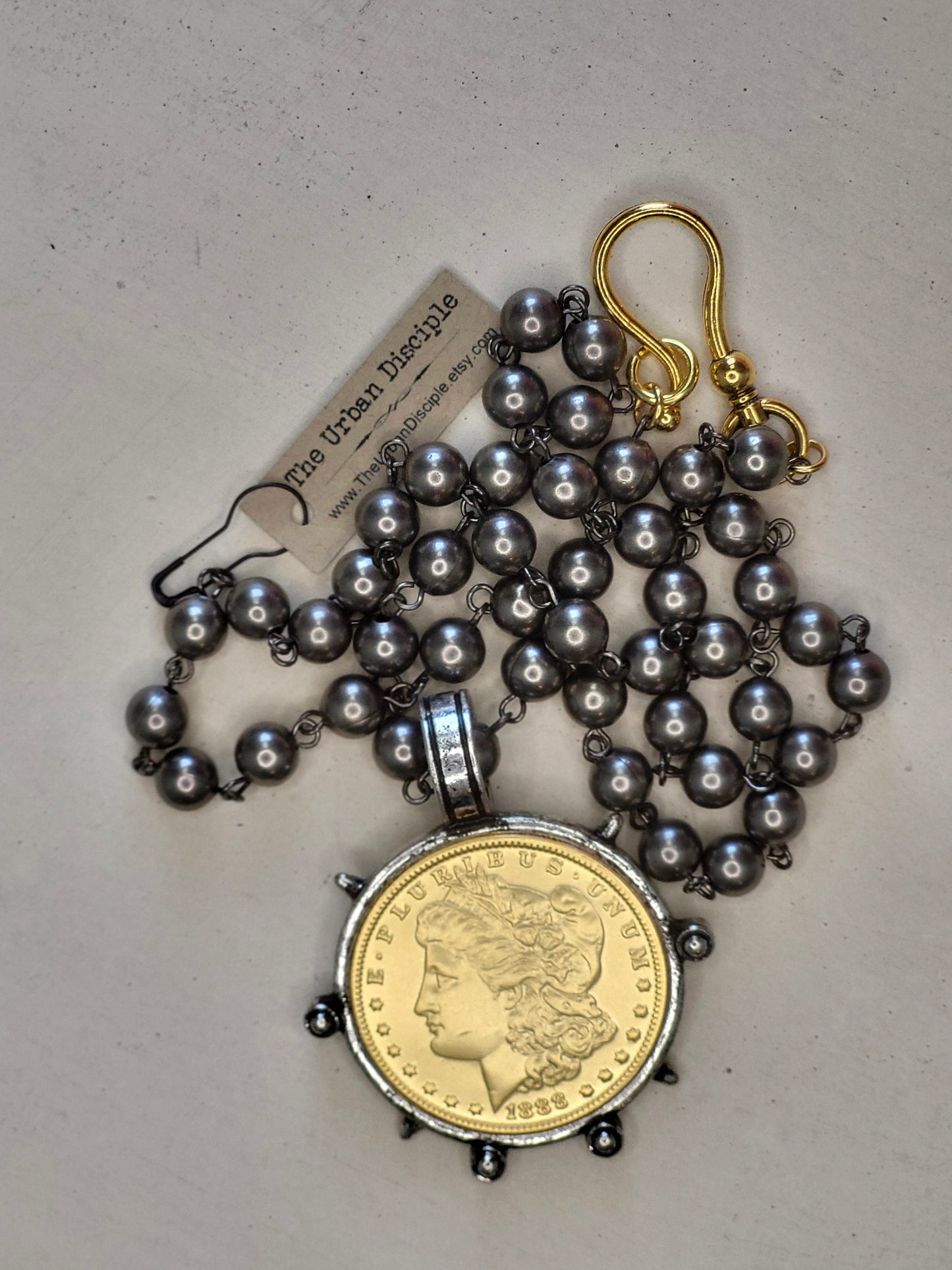 Elegant Black Pearl and Gold Liberty Coin Necklace with Oversized Clasp