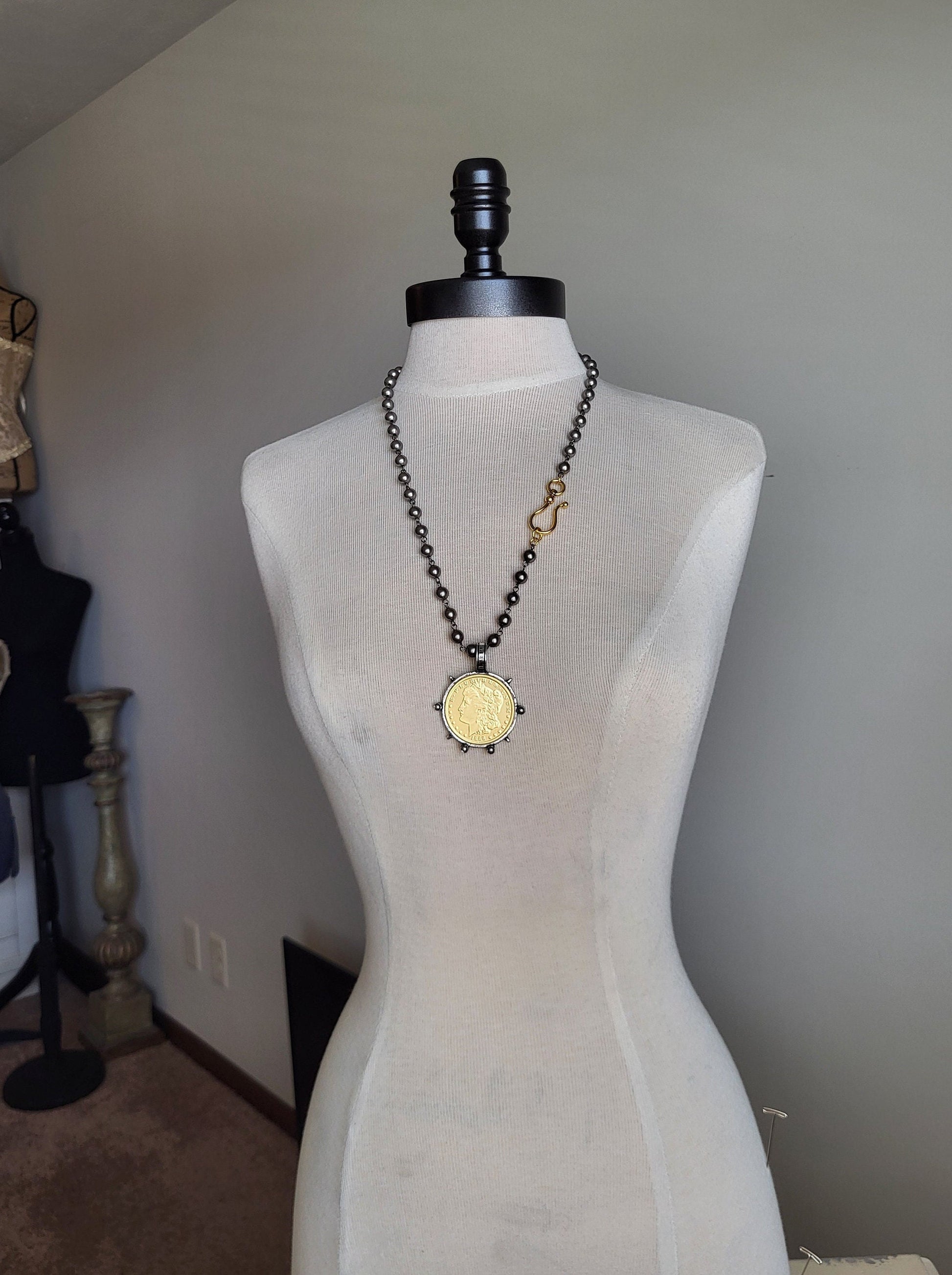 Elegant Black Pearl and Gold Liberty Coin Necklace with Oversized Clasp