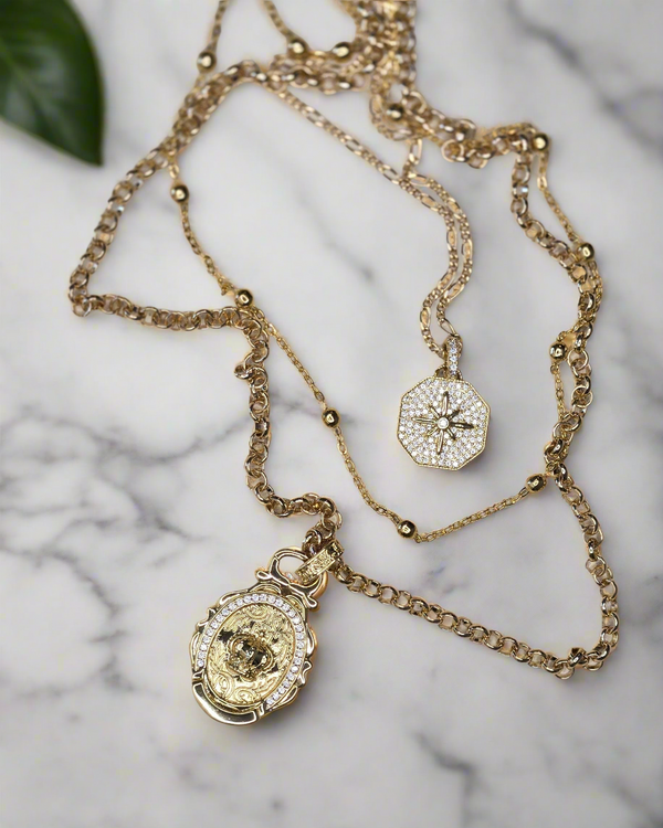Celestial Royalty, Layered Necklace – Pave Starburst, Satellite Chain & Crown Medallion in Gold Tone Finish