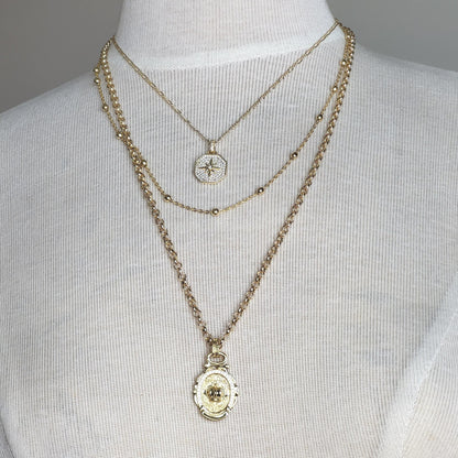 Celestial Royalty, Layered Necklace – Pave Starburst, Satellite Chain & Crown Medallion in Gold Tone Finish