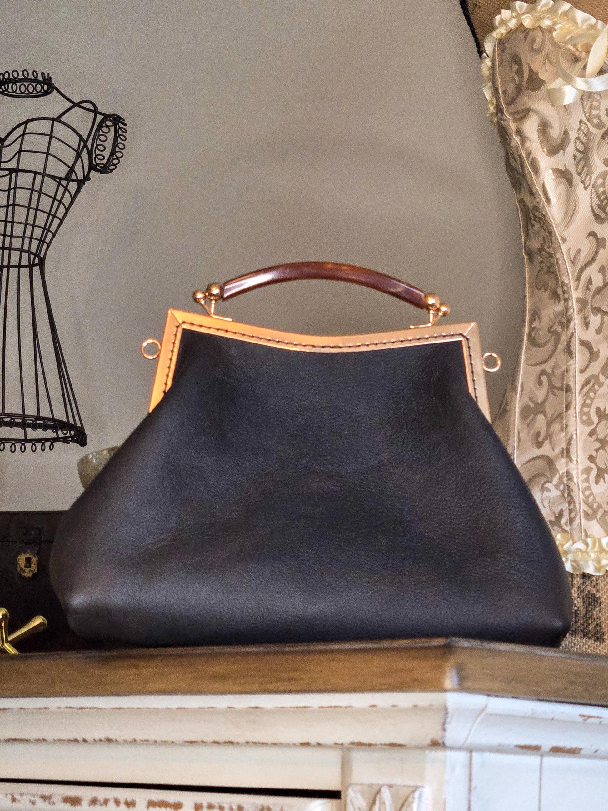 Small Dark Brown Leather Handbag with Ball Clasp Closure and removable Chain Strap