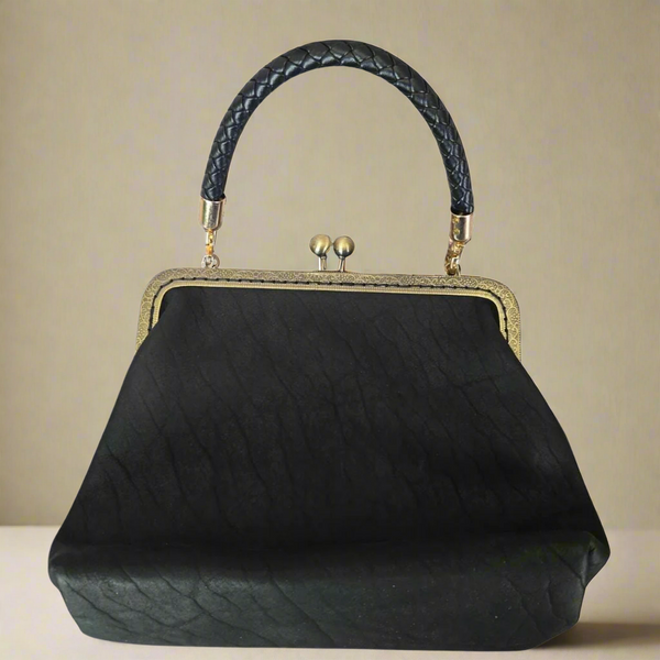 Small Black Leather Handbag with Ball Clasp Closure