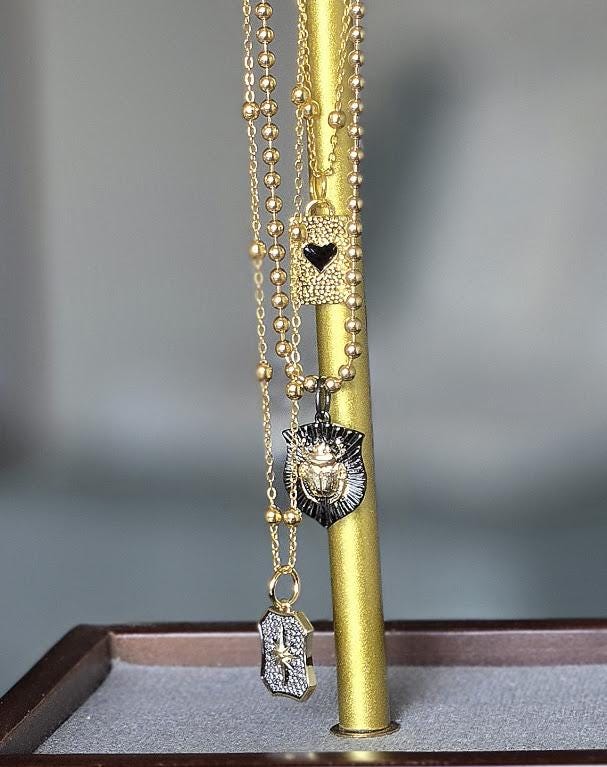 Triple Strand Necklace with Heart, Scarab & Pave Starburst Charms