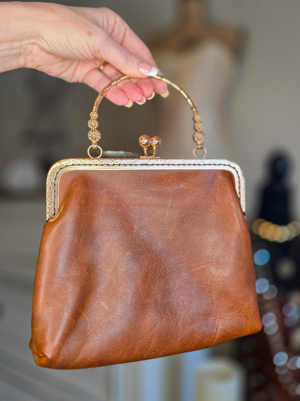 Small Brown Leather Handbag with Ball Clasp Closure