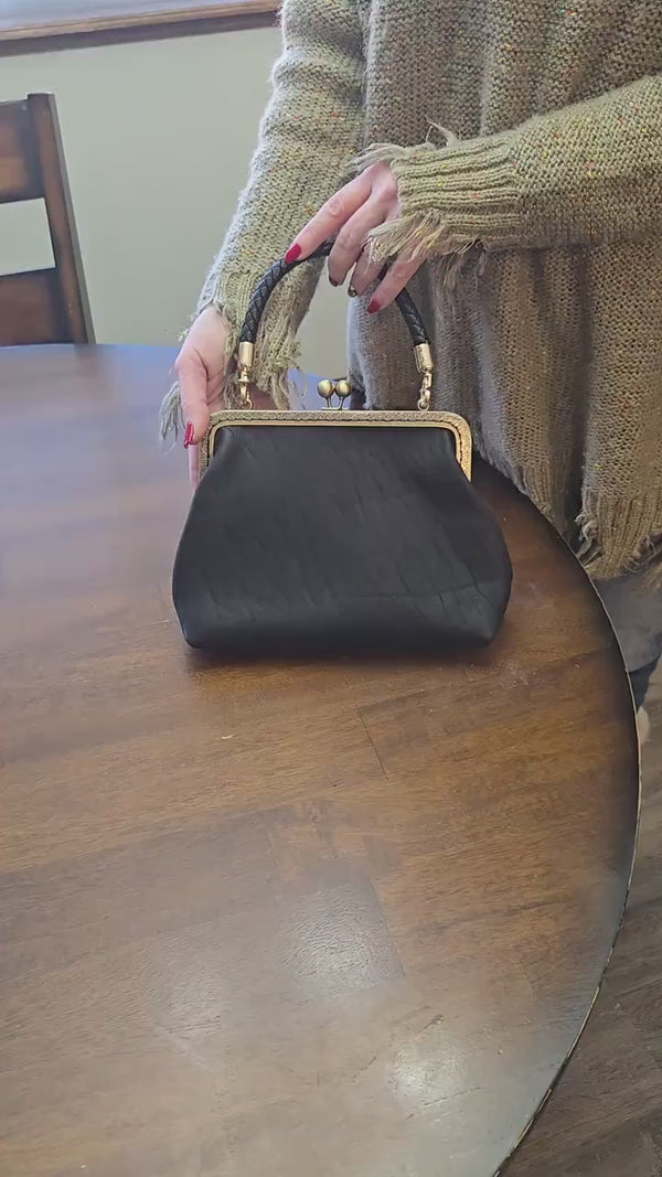 Small Black Leather Handbag with Ball Clasp Closure